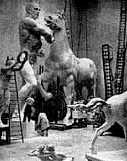 thorak at work in his studio he is under the human knee/horses right foot